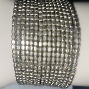 Multi strand cuff bracelet silver in color very nice and comfortable